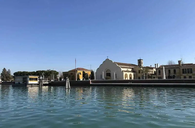 Sant’Erasmo’s waterfront and buildings seen from the water